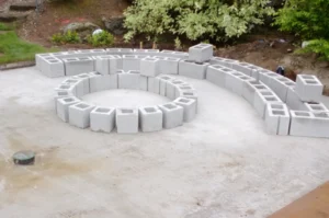Concrete blocks arranged in circular pattern.