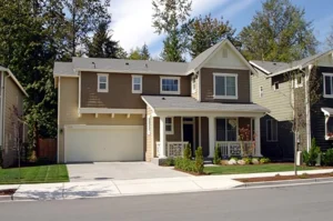 Two-story suburban house with garage.